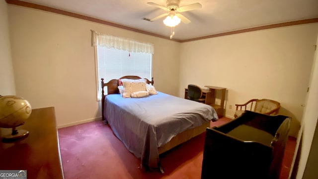 carpeted bedroom featuring ornamental molding and ceiling fan