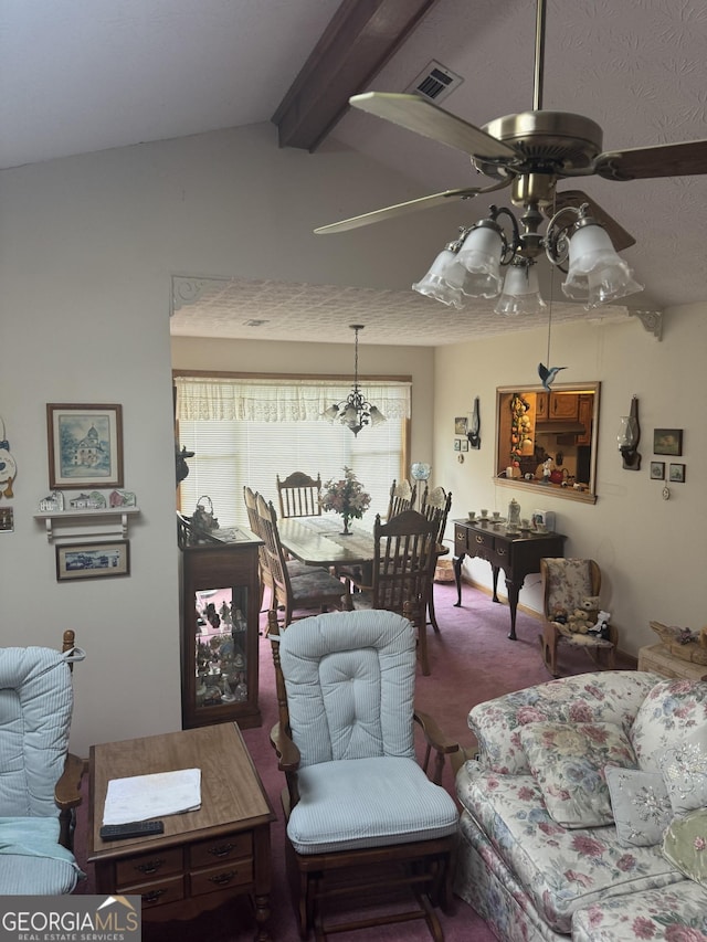 carpeted living room featuring ceiling fan and vaulted ceiling with beams