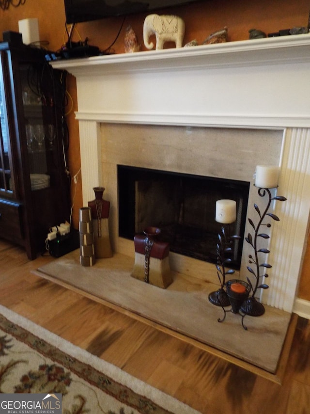 interior details featuring wood-type flooring