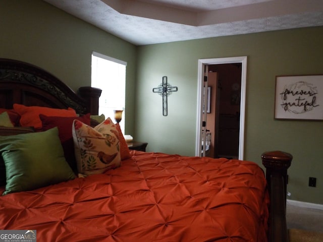 bedroom featuring a textured ceiling