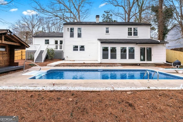 back of house featuring a patio