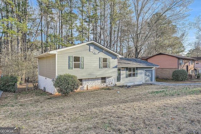 tri-level home featuring a garage