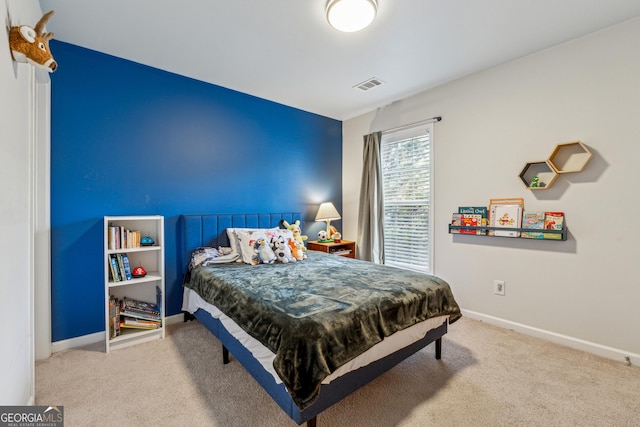 bedroom featuring carpet flooring