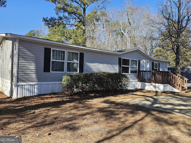 manufactured / mobile home with a deck