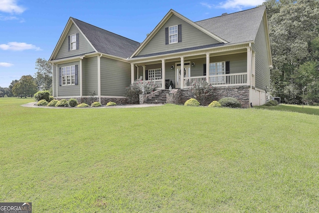 view of front facade featuring a porch and a front lawn