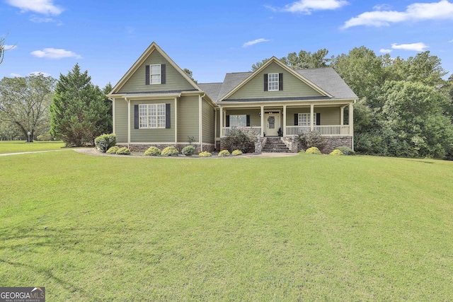 craftsman-style house featuring a front yard and covered porch