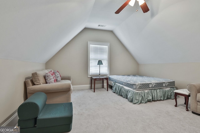 carpeted bedroom featuring ceiling fan and lofted ceiling