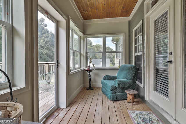 sunroom with wooden ceiling