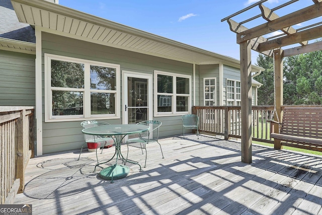 wooden terrace with a pergola