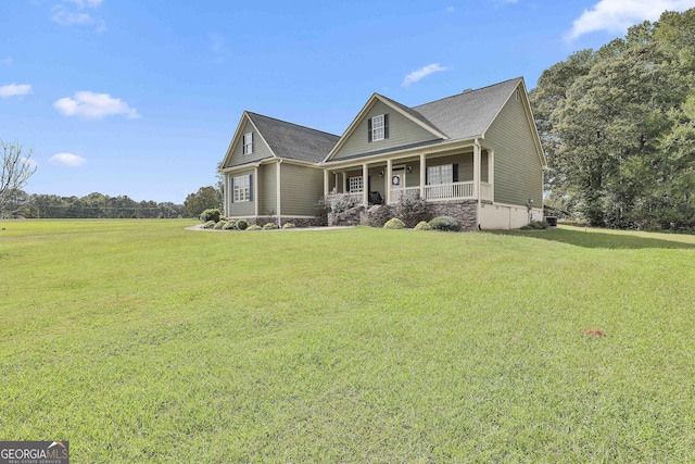 view of front of house featuring a porch and a front yard