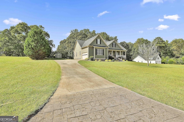 view of front facade with a garage, covered porch, and a front lawn