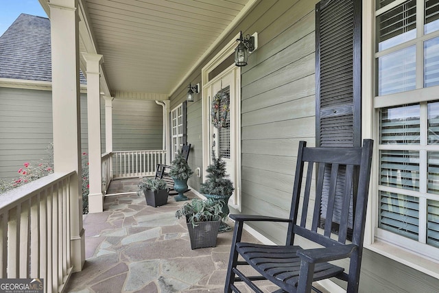 balcony featuring a porch