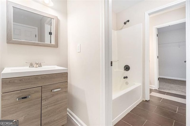 bathroom featuring vanity and shower / bathing tub combination