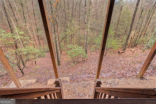 view of yard featuring a view of trees