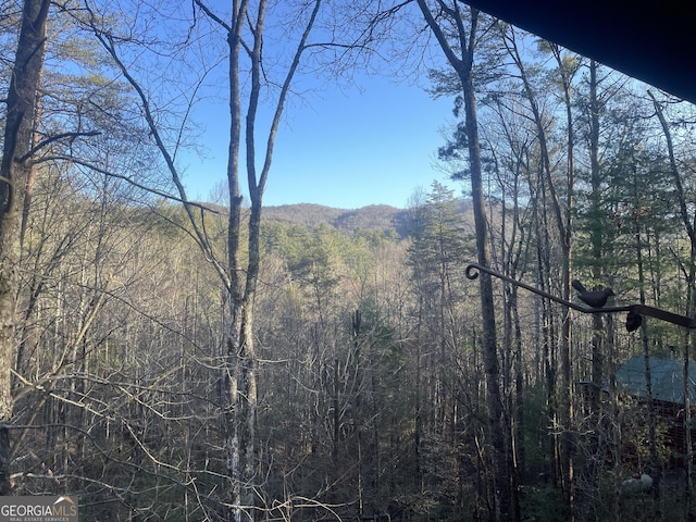 mountain view with a view of trees