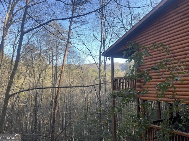 exterior space with a view of trees