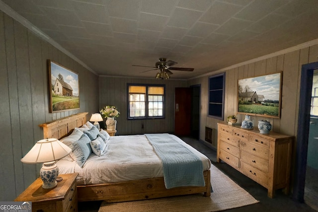 bedroom with crown molding and ceiling fan