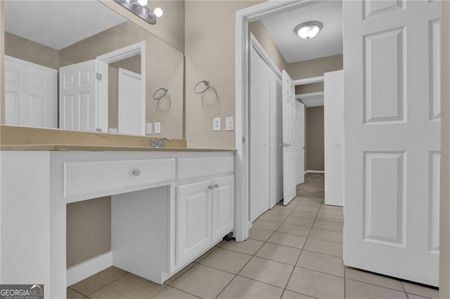 bathroom with vanity and tile patterned floors