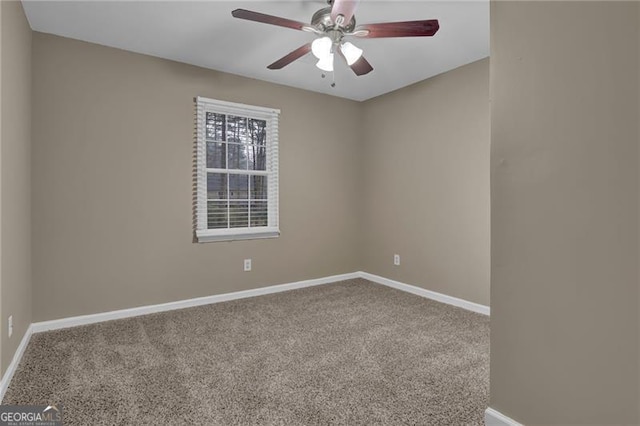 carpeted empty room with ceiling fan