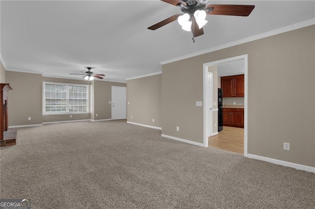 unfurnished living room featuring a brick fireplace, crown molding, light colored carpet, and ceiling fan