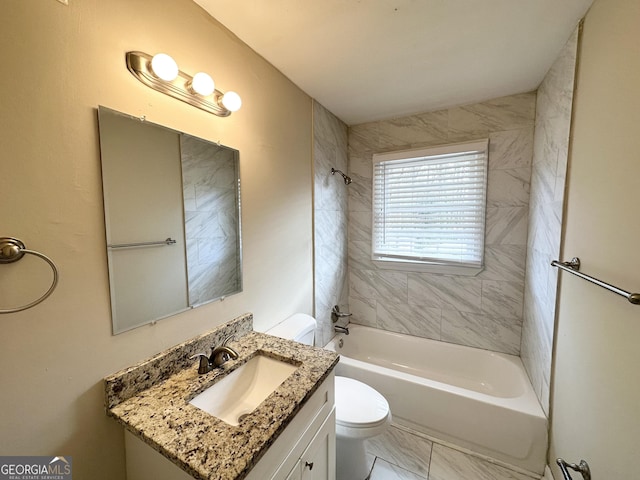 full bathroom with tiled shower / bath, vanity, and toilet