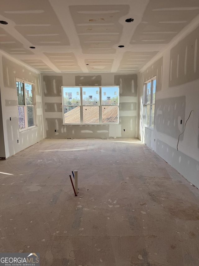 unfurnished living room with a healthy amount of sunlight