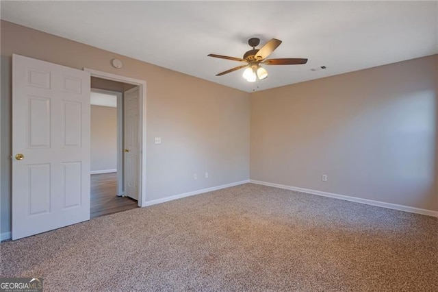 carpeted spare room with a textured ceiling