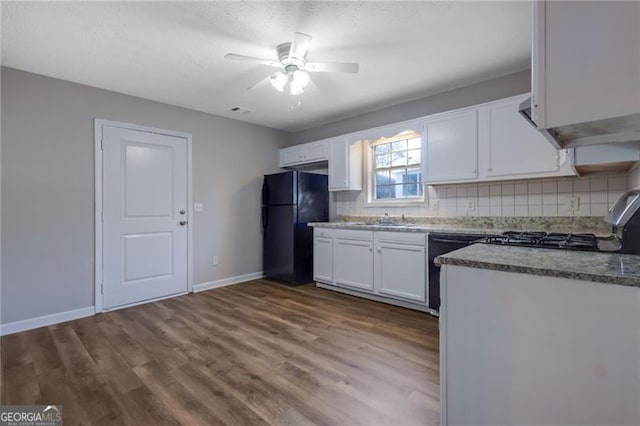 additional living space featuring vaulted ceiling, carpet floors, and a textured ceiling