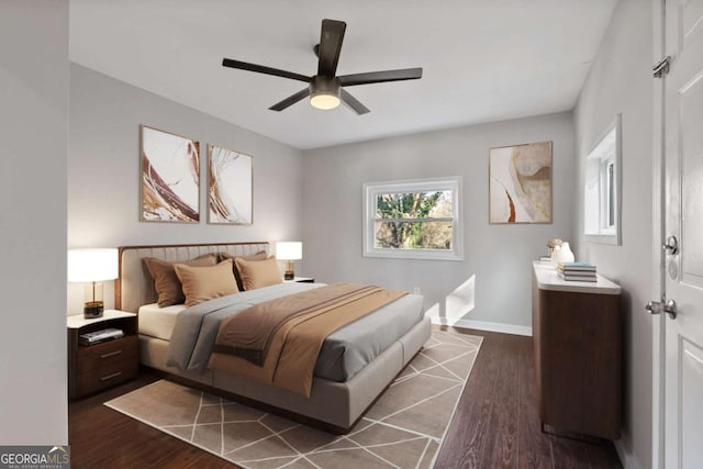 bedroom featuring dark hardwood / wood-style floors and ceiling fan