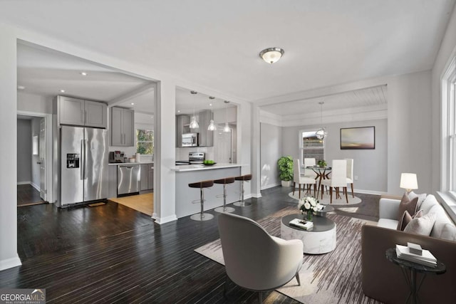 dining area with dark wood-type flooring