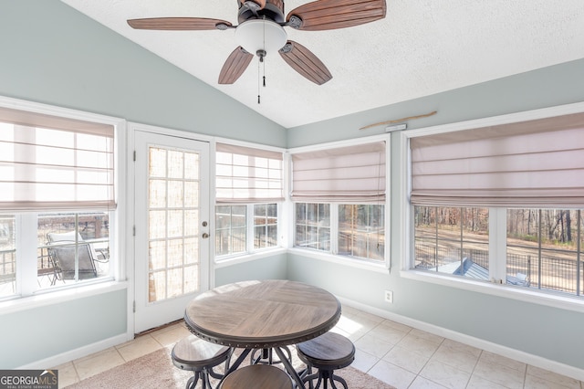 sunroom / solarium featuring vaulted ceiling and ceiling fan