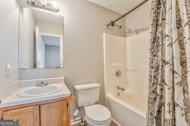 full bathroom with vanity, toilet, and shower / tub combo with curtain