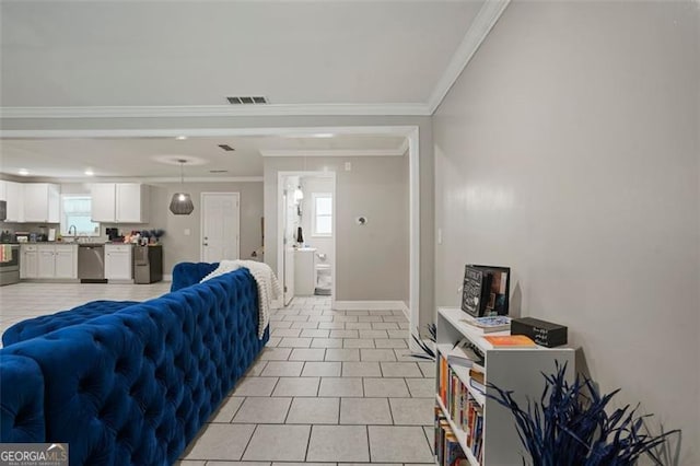 living room with crown molding and light tile patterned floors