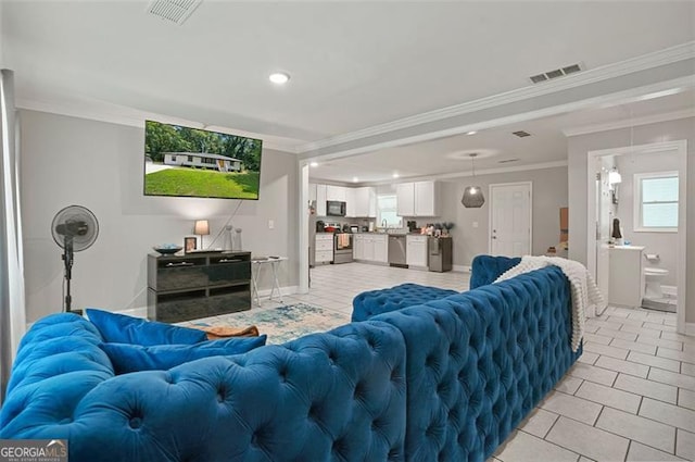 tiled living room with crown molding