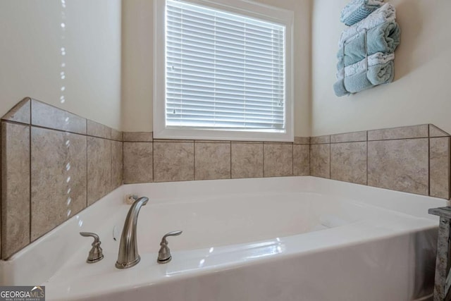 bathroom with a tub