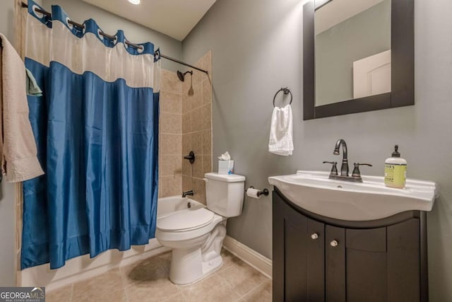 full bathroom with tile patterned flooring, vanity, shower / bathtub combination with curtain, and toilet