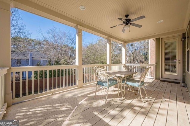 wooden terrace with ceiling fan