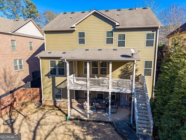 back of property featuring a patio area