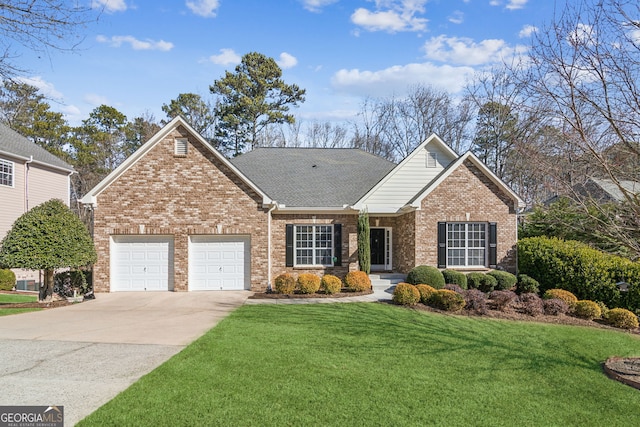 front facade featuring a garage and a front yard