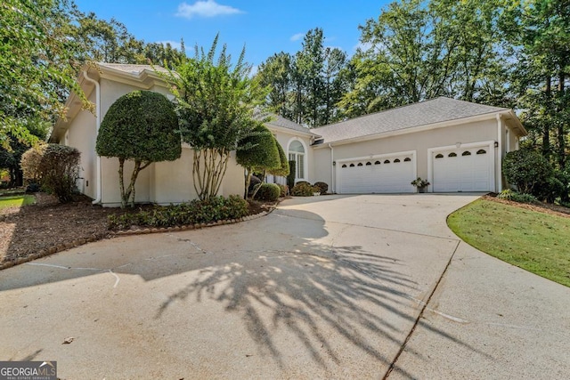 view of front of home featuring a garage