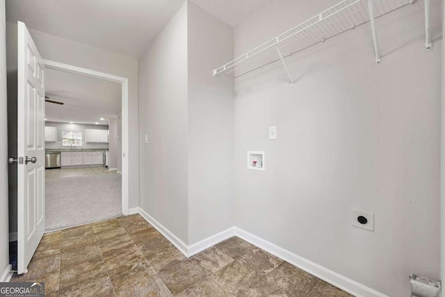 laundry room featuring hookup for a washing machine, sink, and hookup for an electric dryer