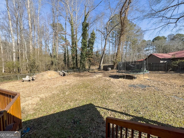 view of yard featuring a trampoline