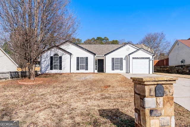 ranch-style home with a garage