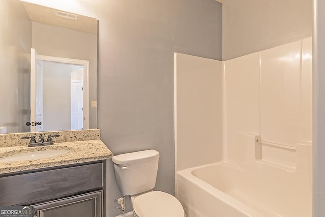 full bathroom featuring vanity, shower / bathtub combination, and toilet