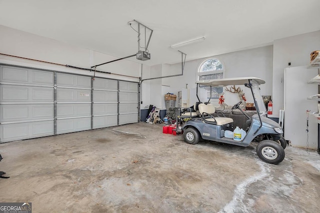 garage featuring a garage door opener