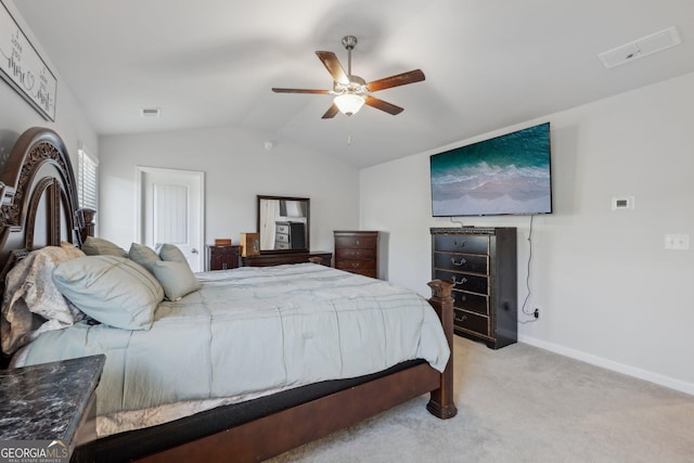 carpeted bedroom with lofted ceiling and ceiling fan