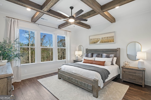 bedroom featuring visible vents, baseboards, coffered ceiling, and hardwood / wood-style flooring