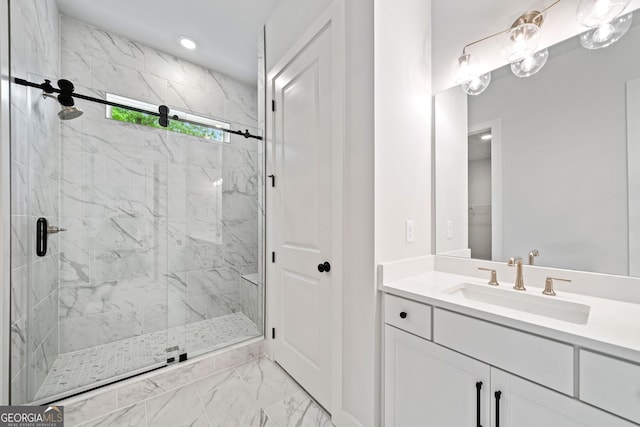 full bath featuring double vanity, a shower stall, a sink, and marble finish floor