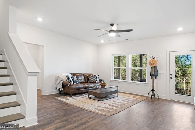 living area with visible vents, dark wood-type flooring, ceiling fan, stairway, and recessed lighting