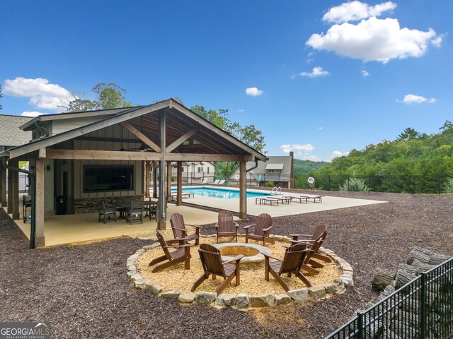 view of patio / terrace featuring a forest view